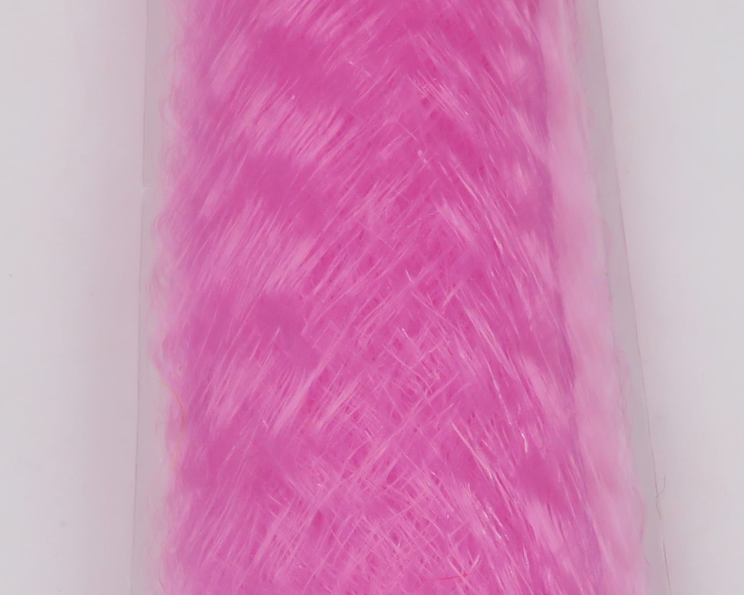 Bright hot-pink slinky fibre with shiny, wispy synthetic strands for fly tying
