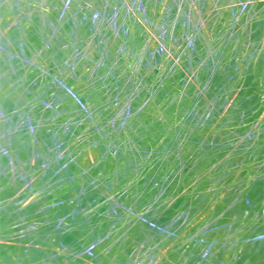 Chartreuse green synthetic dubbing fibers with fine iridescent flash strands for fly tying