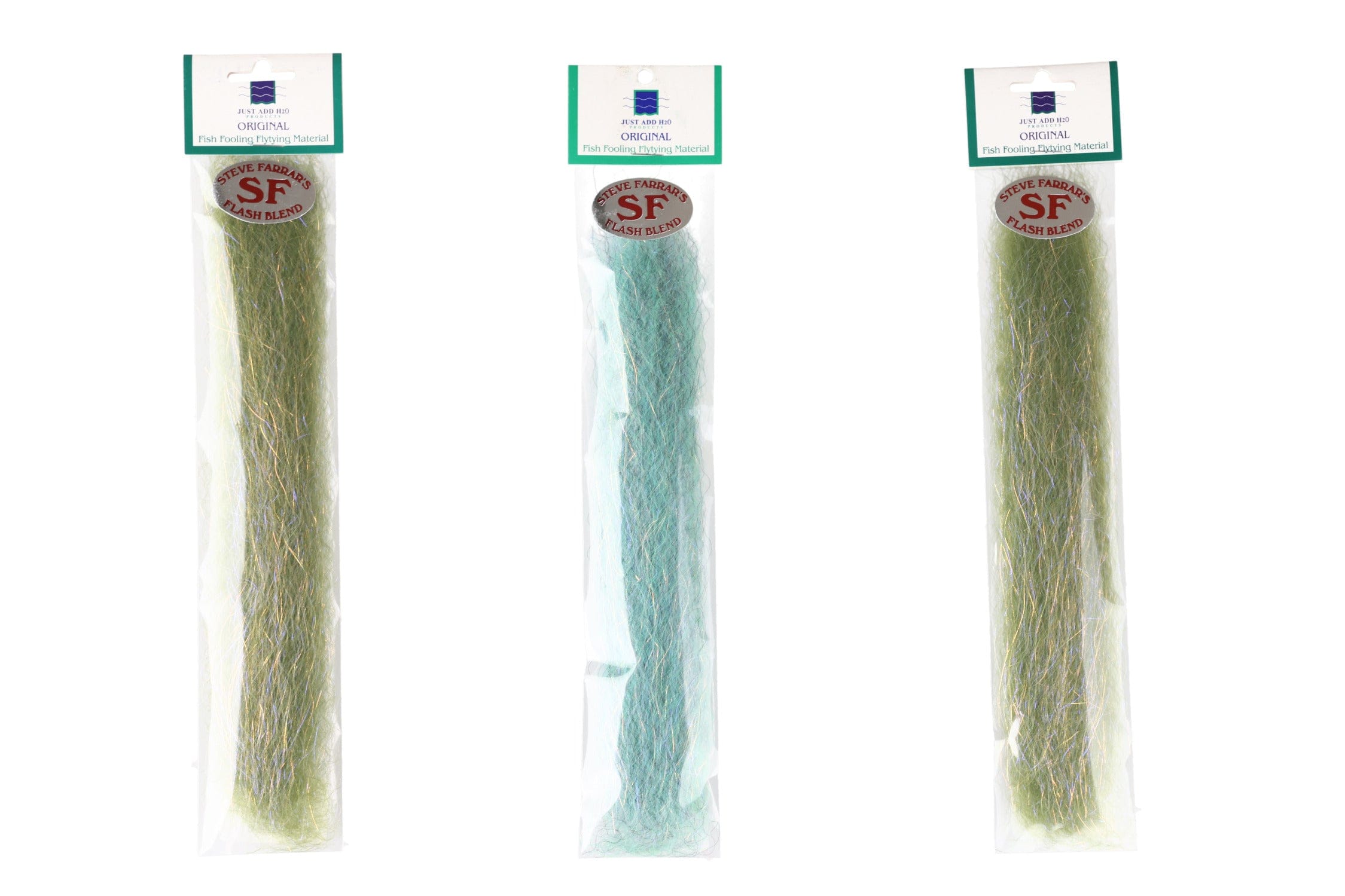 Three packaged Steve Farrar SF flash blend fly tying fibers in olive green and teal, iridescent synthetic strands