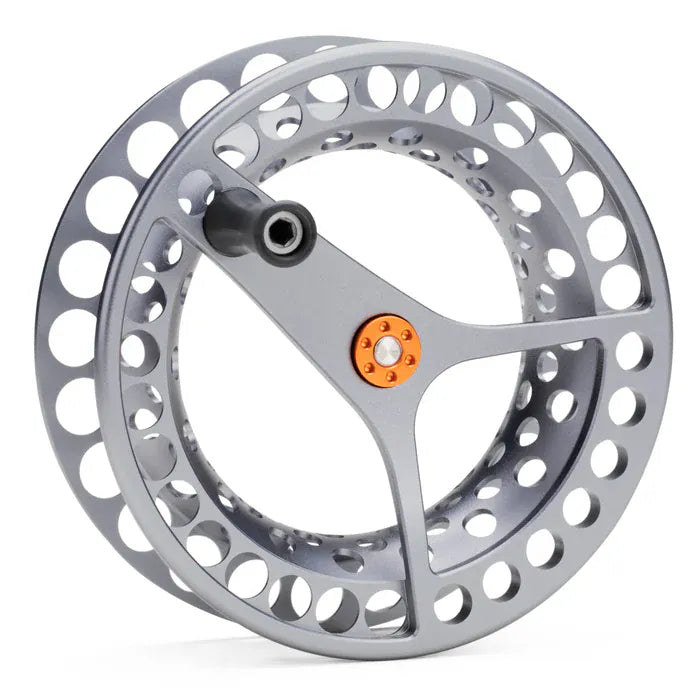 Lamson spare spool: machined silver aluminum reel with large circular cutouts, three-arm frame and orange hub accent