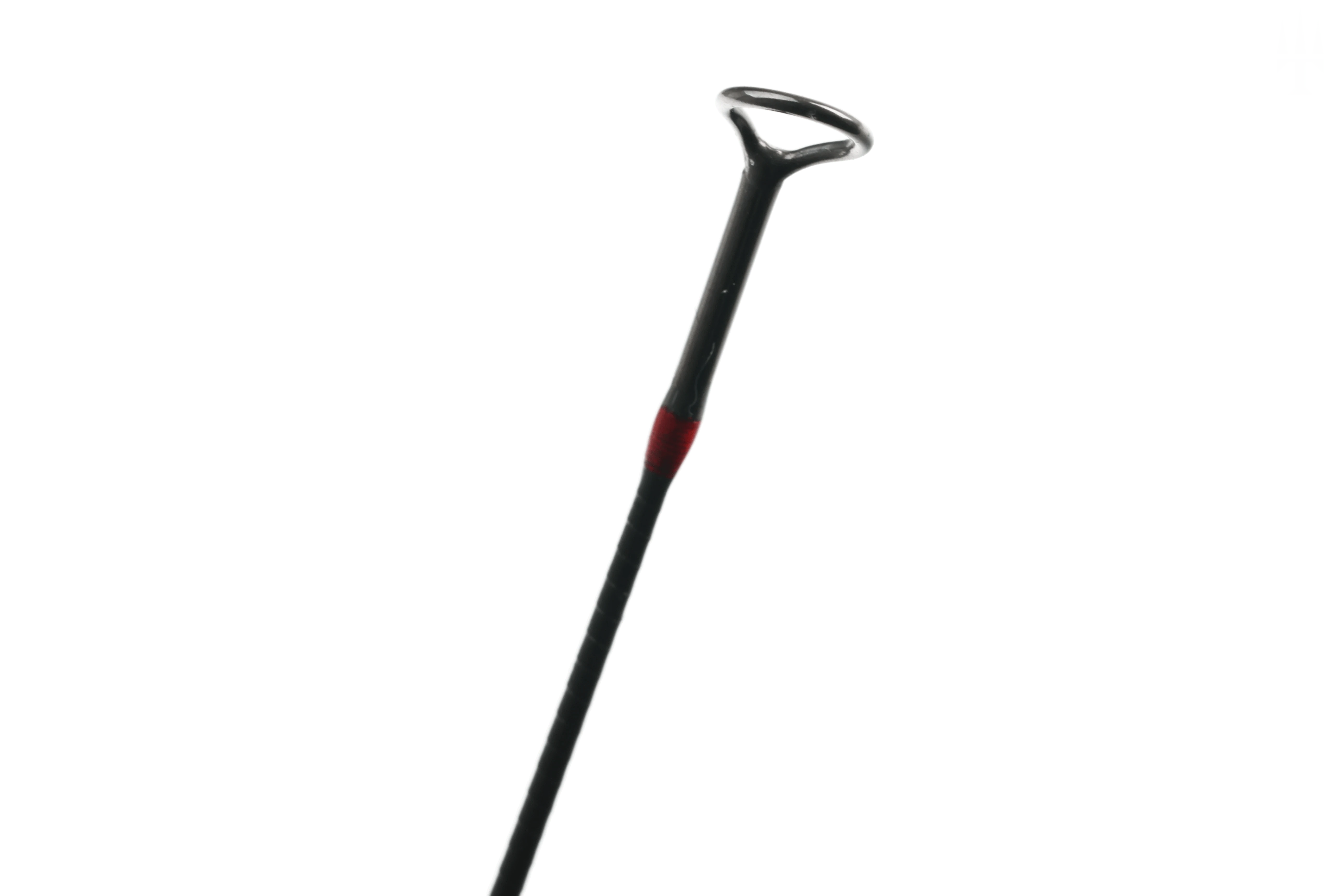 Lamson Purist fly rod black carbon shaft with glossy black loop guide and red thread wrap detail on matte black background