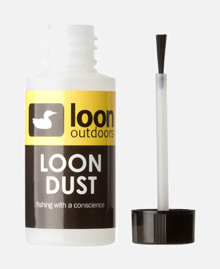 Loon Dust plastic bottle with yellow-black label and brush applicator cap, fly tying dust treatment for flies