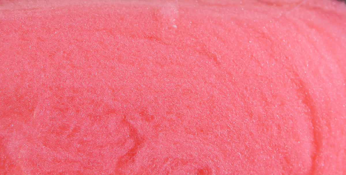 McFlyFoam fly tying yarn in bright coral pink, soft fibrous foam with subtle sparkle