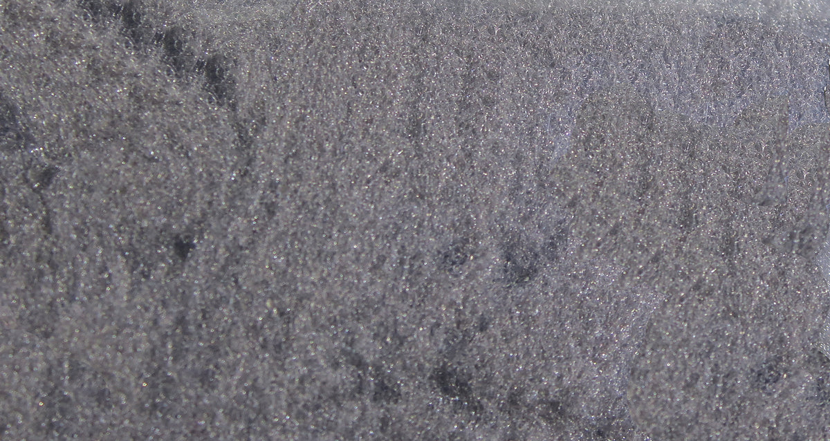 Gray McFlyFoam fly tying yarn close-up showing fine foam texture with subtle silver sparkle fibers