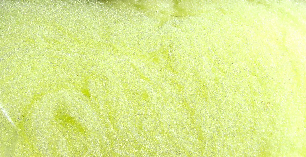 Chartreuse yellow McFlyFoam fly tying yarn close-up of fluffy synthetic foam fibers for fly tying