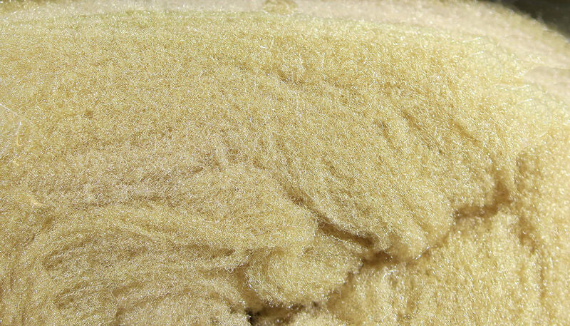 Pale yellow-beige McFlyFoam fly tying yarn, fluffy synthetic batt with fine iridescent sparkle fibers