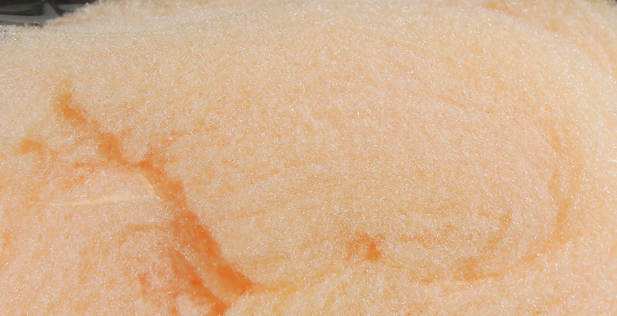 McFlyFoam peach fly tying yarn close-up showing soft fibrous foam texture with subtle sparkle