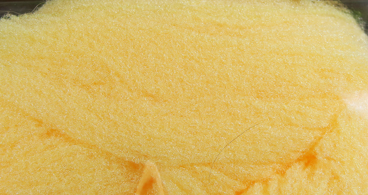 Yellow McFlyFoam fly tying yarn with fine fuzzy foam texture and subtle orange veining