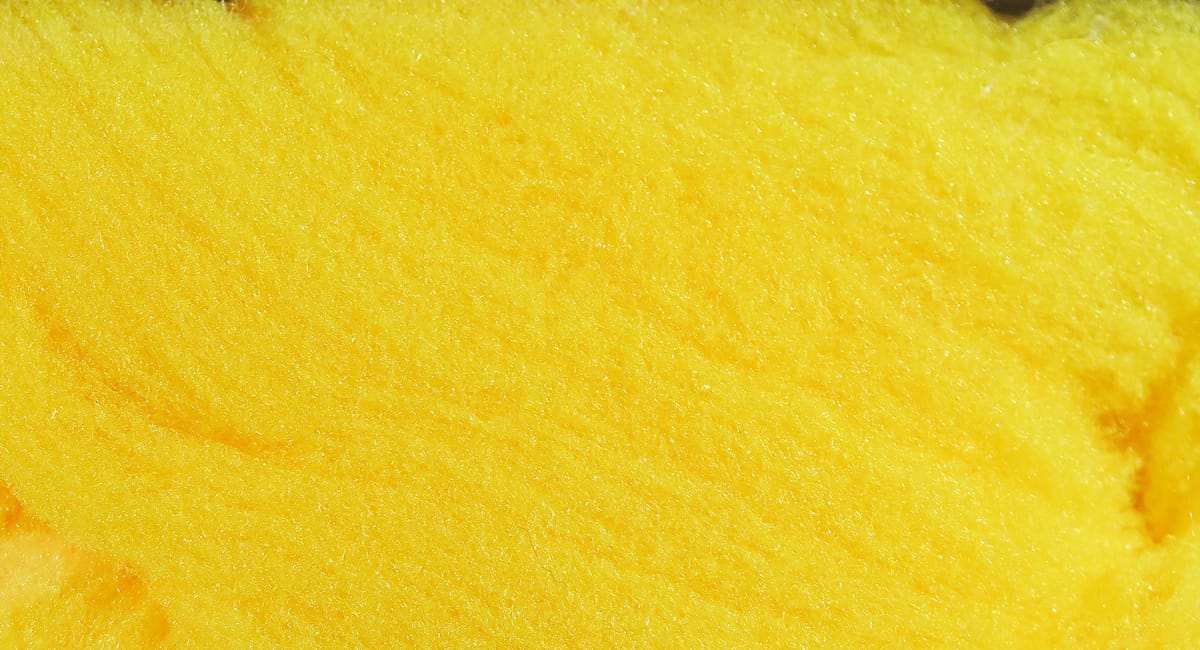 Bright yellow McFlyFoam foam yarn with soft fuzzy synthetic texture for fly tying and lure bodies