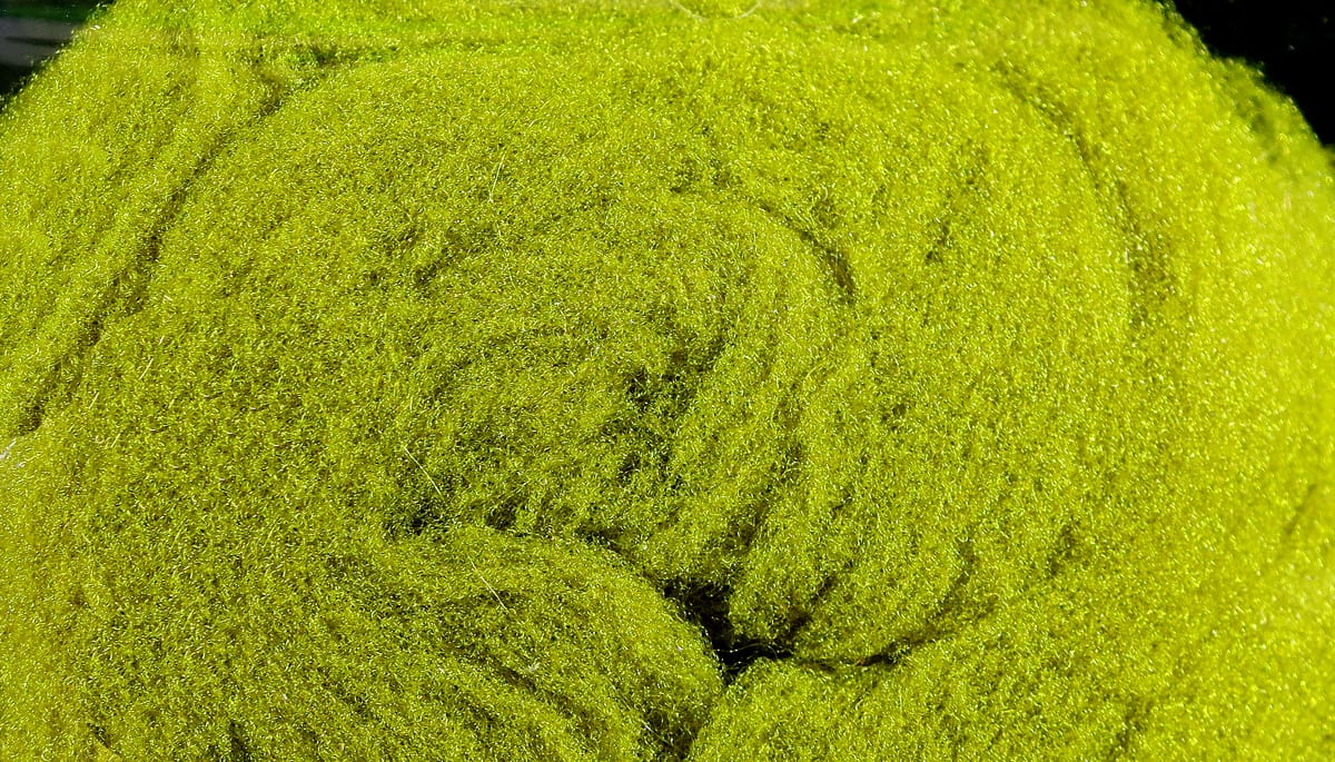 McFlyFoam fly tying yarn in chartreuse, close-up of fuzzy synthetic foam fibers with subtle iridescent flash