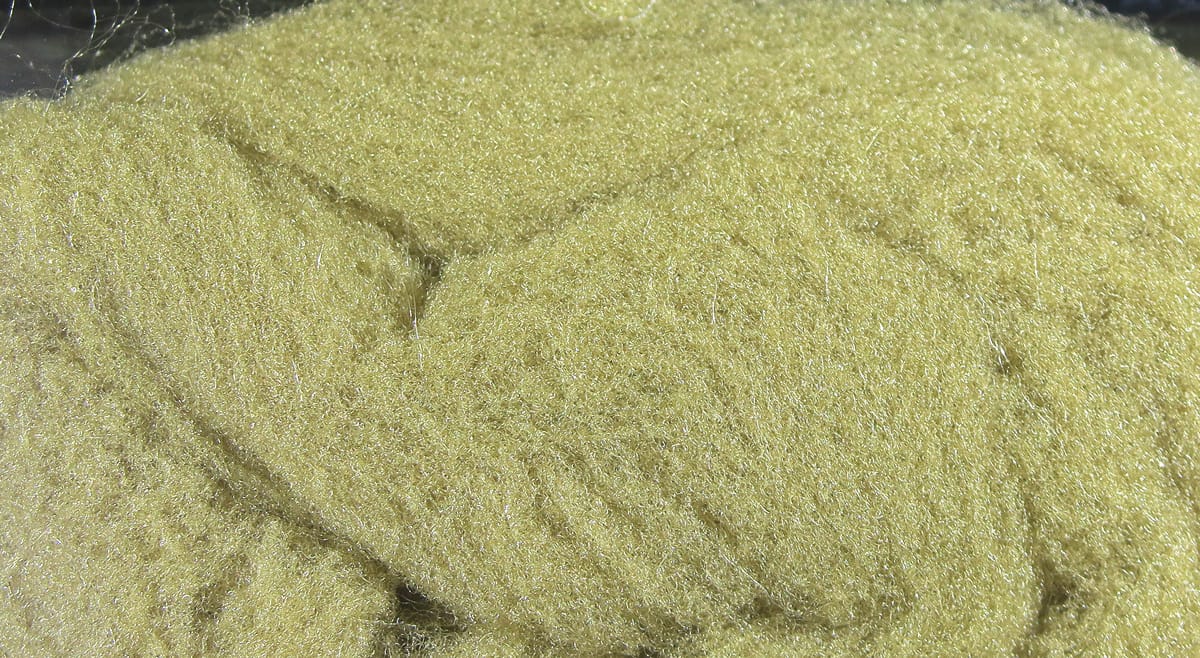 Olive green McFlyFoam fly tying yarn, loose fibrous synthetic foam with fine iridescent strands