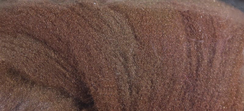 Brown sparkly McFlyFoam fly tying yarn close-up showing fuzzy foam fibers with subtle iridescent glitter