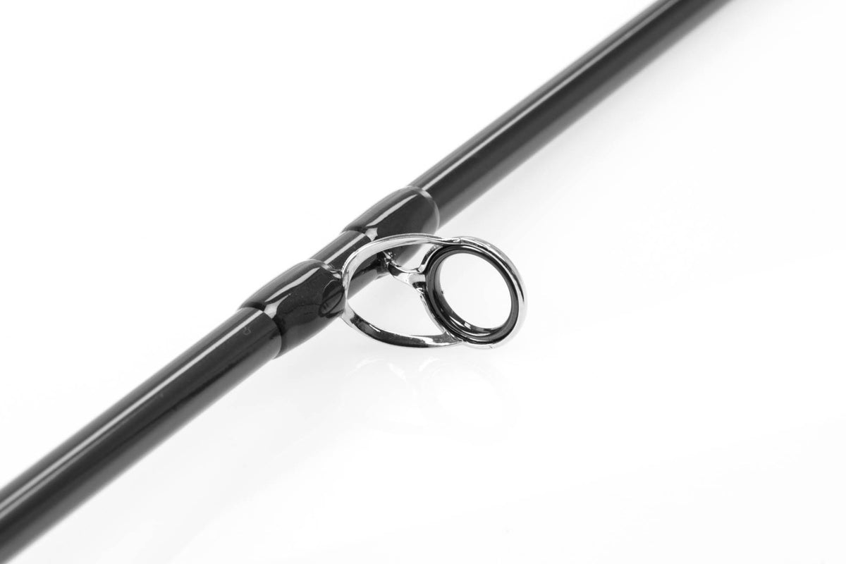 Orvis Clearwater fly rod close-up showing glossy black graphite blank and polished chrome guide ring