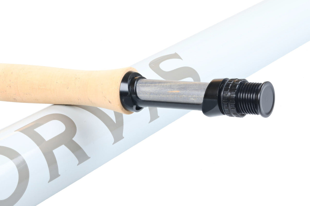 Orvis Helios 4D fly rod cork handle and gray carbon reel seat with black anodized locking nut on pale blue blank
