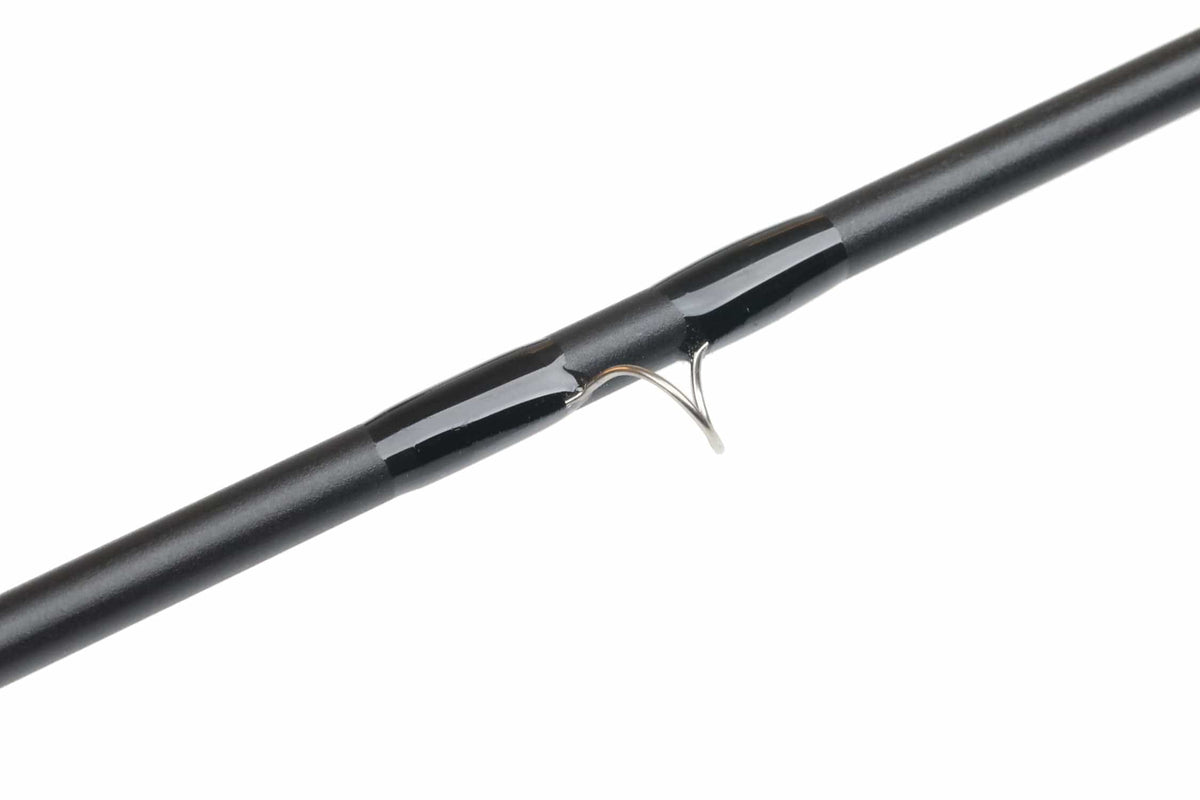Orvis Helios 4D matte black fly rod blank with glossy black guide wraps and chrome guide foot