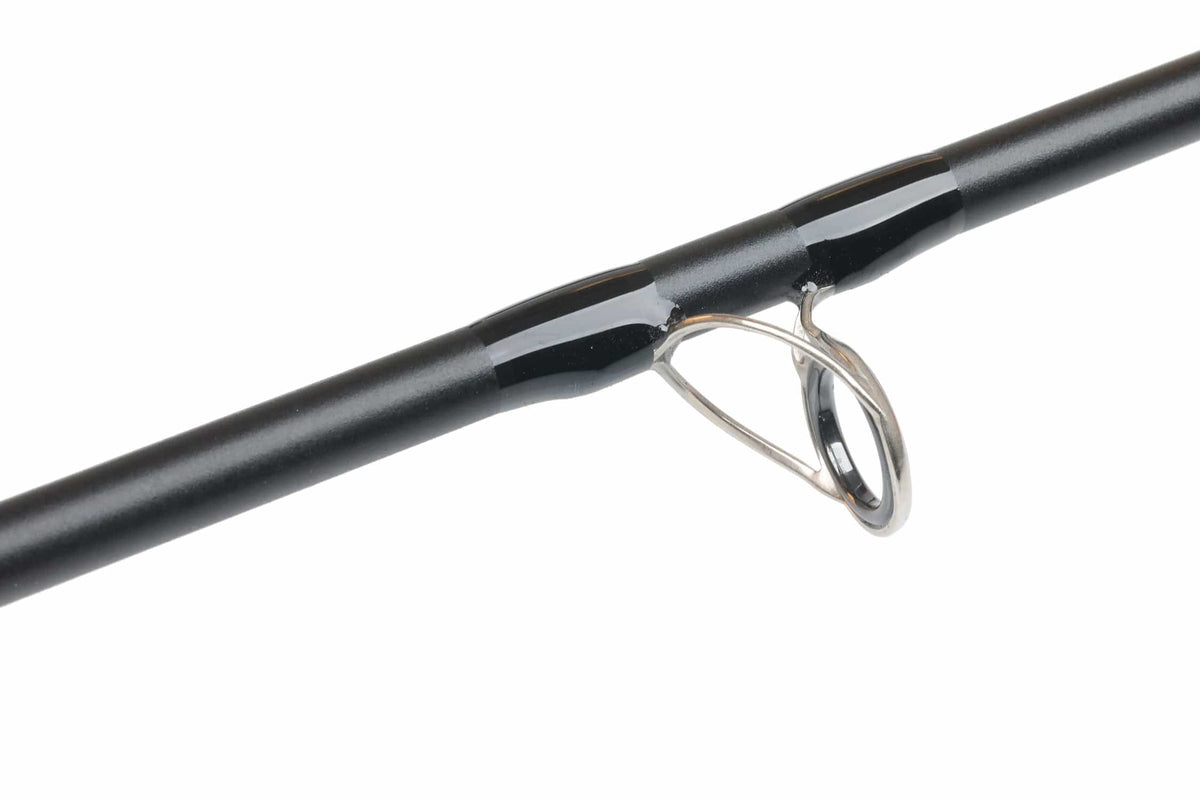 Orvis Helios 4 D matte black graphite fly rod with glossy black wraps and stainless silver guide ring
