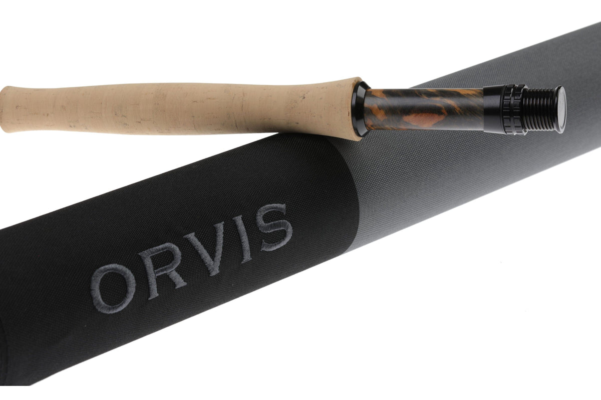 Orvis Recon 3 fly rod cork handle and brown marbled reel seat with black locking ring resting on black Orvis rod tube