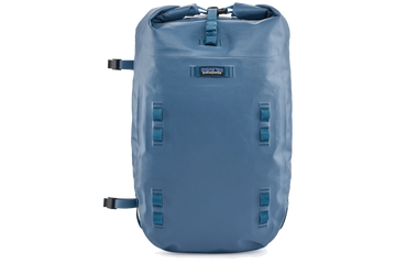 Blue Patagonia Disperser roll-top pack in waterproof fabric with lash points, top buckle closure and sleek silhouette