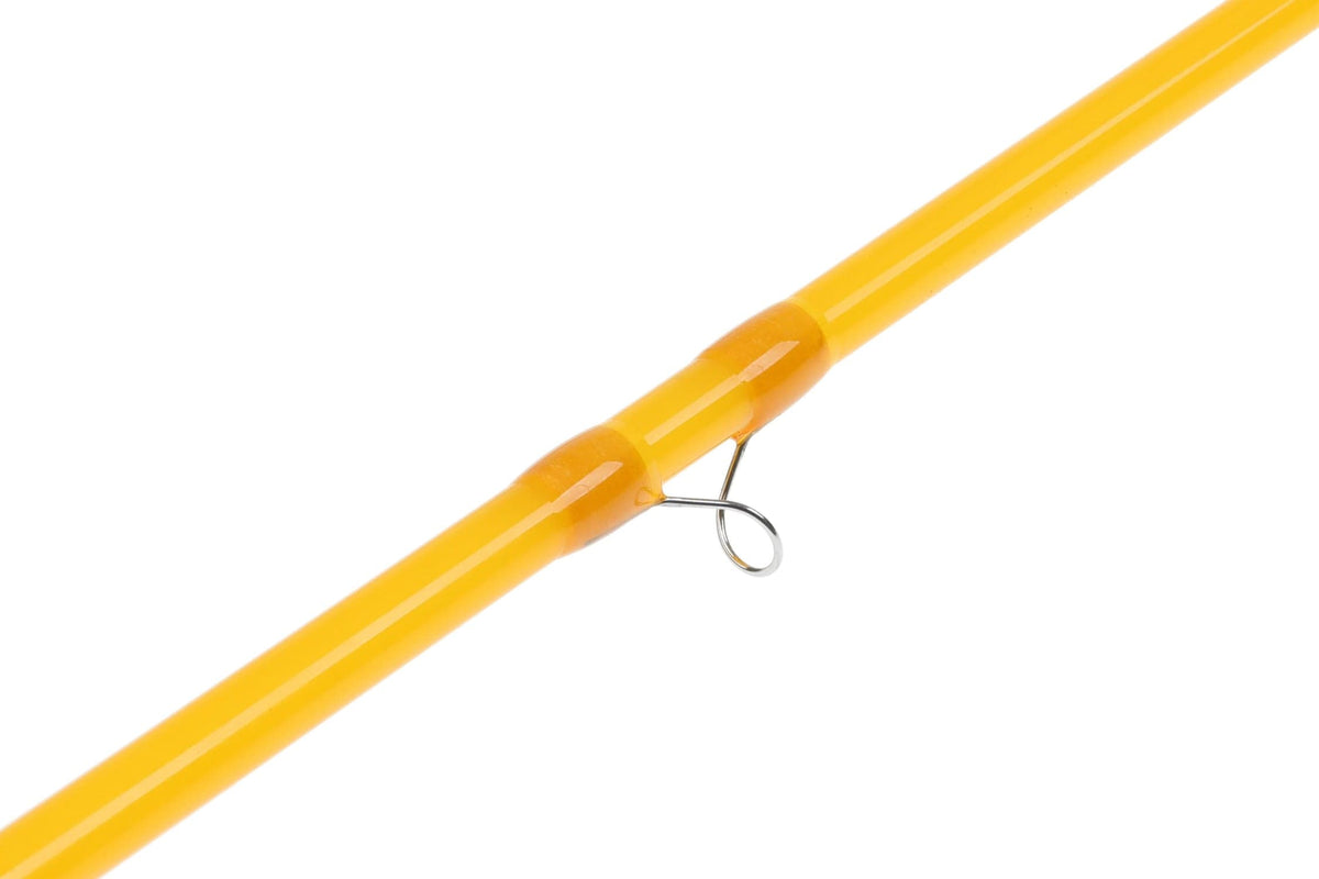 Glossy yellow Redington fly rod section with tapered fiberglass blank and chrome guide ring