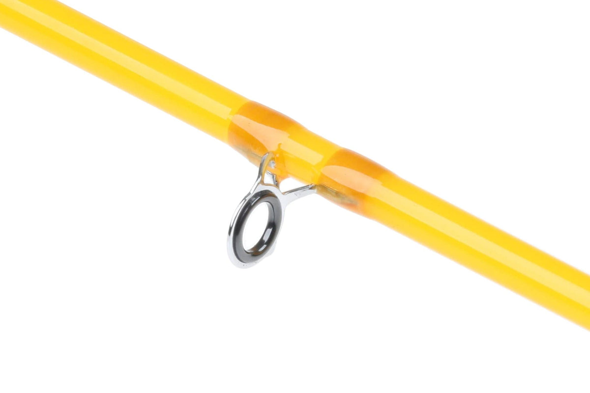 Bright yellow glossy Redington Butter Stick fly rod section showing chrome guide ring on tapered fiberglass shaft