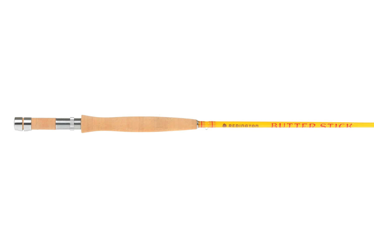 Redington Butter Stick yellow fly rod with natural cork handle, silver metal reel seat