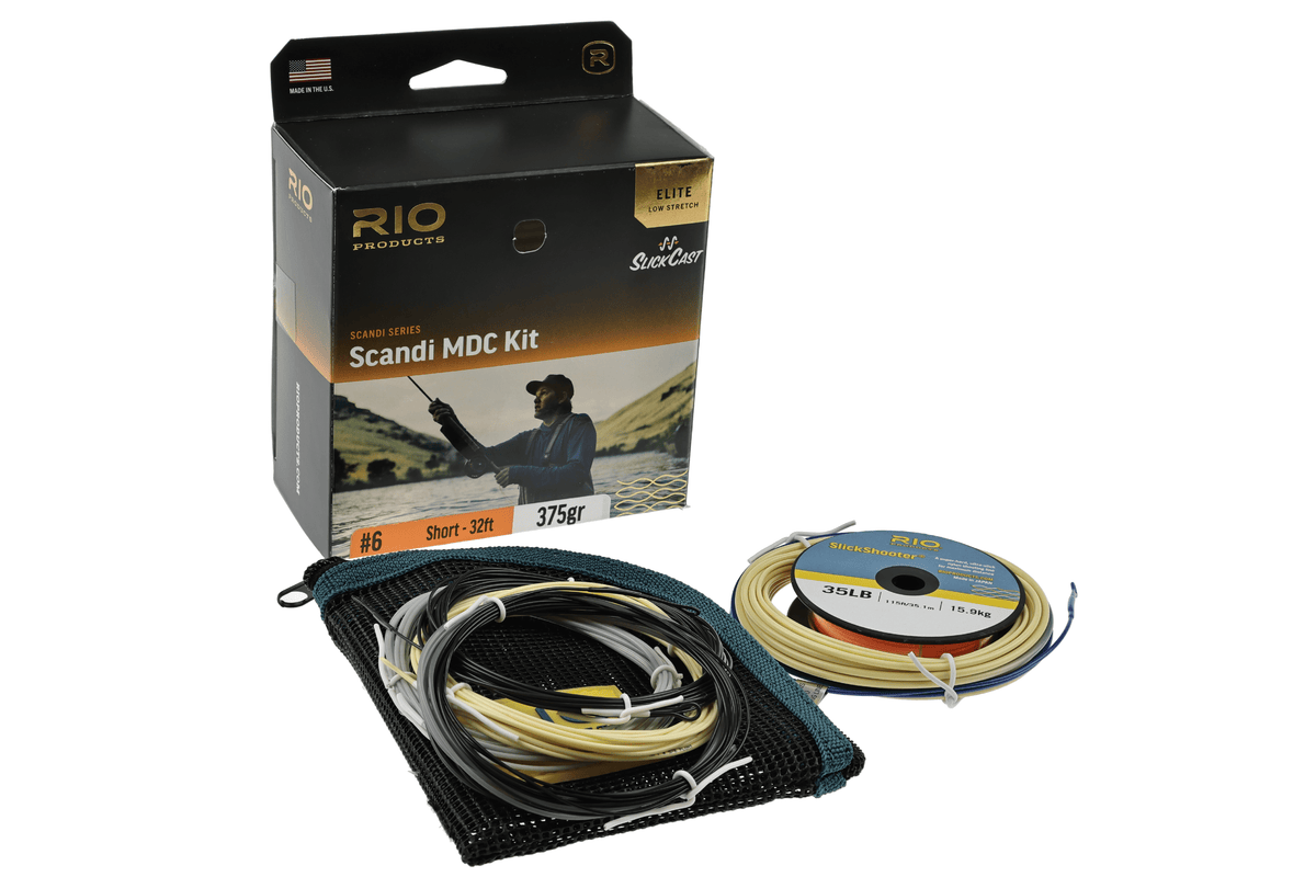 Black and gold Rio Scandi MDC kit box with teal mesh bag and coiled yellow and black fly line spool (35LB) for fly fishing