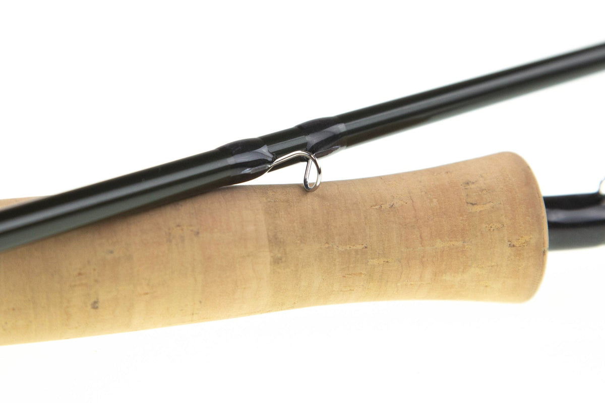 Sage R8 Core graphite fly rod section with glossy dark olive blank, stainless guide and cork handle
