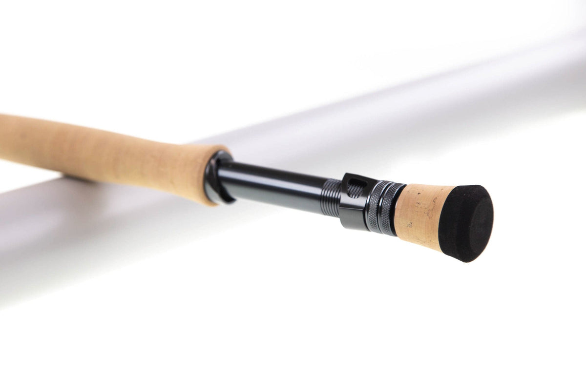 Sage R8 Core fly rod close-up of cork handle and black anodized reel seat on matte graphite blank