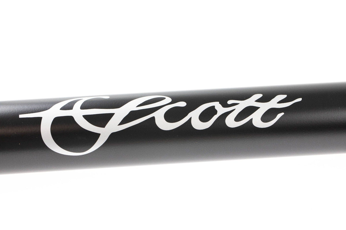 Black matte carbon Scott Centric fly rod section with prominent white cursive logo