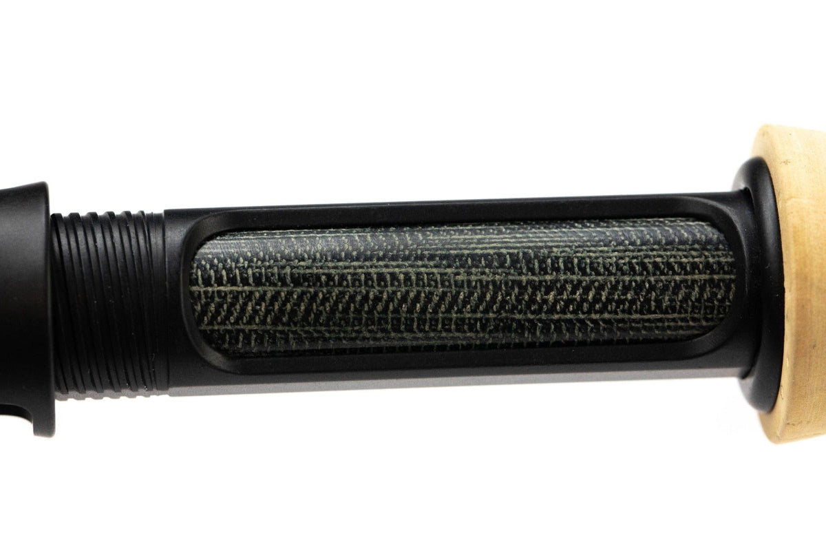 Scott Centric fly rod black reel seat with textured green woven carbon fiber insert and light cork handle