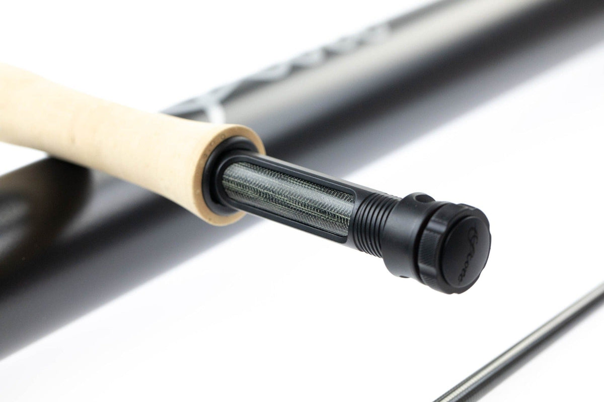 Scott Centric fly rod beige cork handle and black reel seat with exposed carbon fiber insert and matte black blank