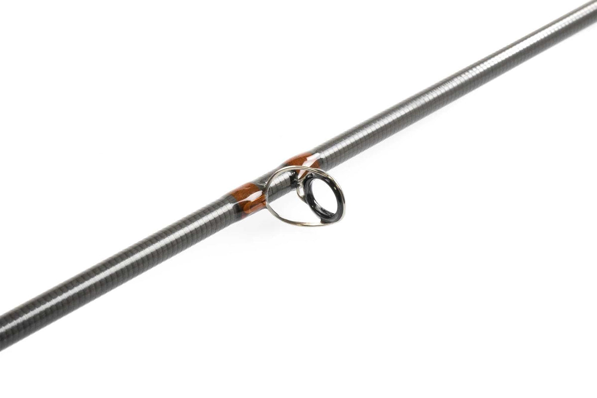 Scott G Series fly rod section with grey carbon fiber blank, brown epoxy wraps and polished stainless guide ring
